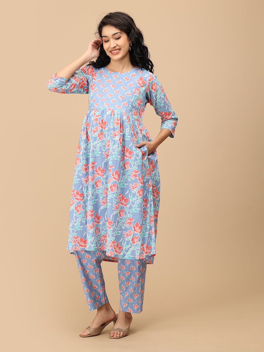 Side view of blue floral Saanjh Phool maternity kurta with empire waist – comfortable pregnancy wear.