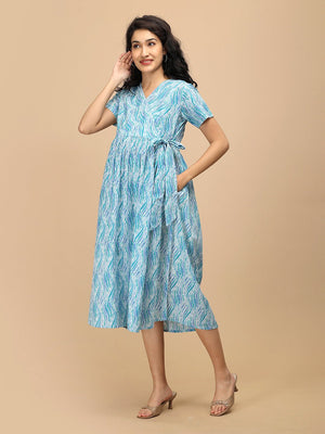 Seafoam Streaks Maternity and Nursing Dress ‚Äì angled front view highlighting wrap tie waist, short sleeves, and comfortable fit.