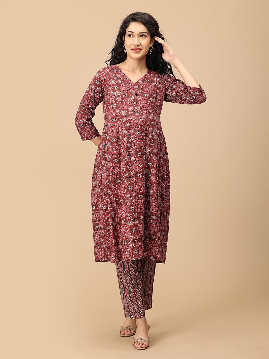 Front view of Sienna Bloom maternity ethnic striped pants with relaxed fit and elastic waist.