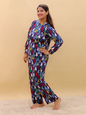 playful side pose by Pregnant model wearing Silent Night Maternity Pajama Set from the mom store