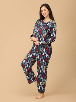 playful pose by Pregnant model wearing Silent Night Maternity Pajama Set from the mom store