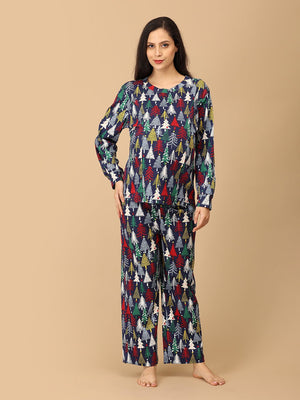 Pregnant model wearing Silent Night Maternity Pajama Set from the mom store