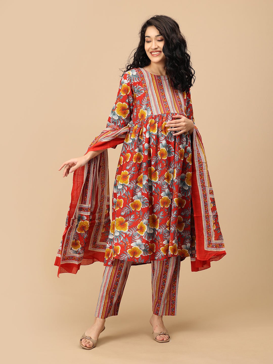 Flowy red printed dupatta styled with floral maternity kurta and striped pants