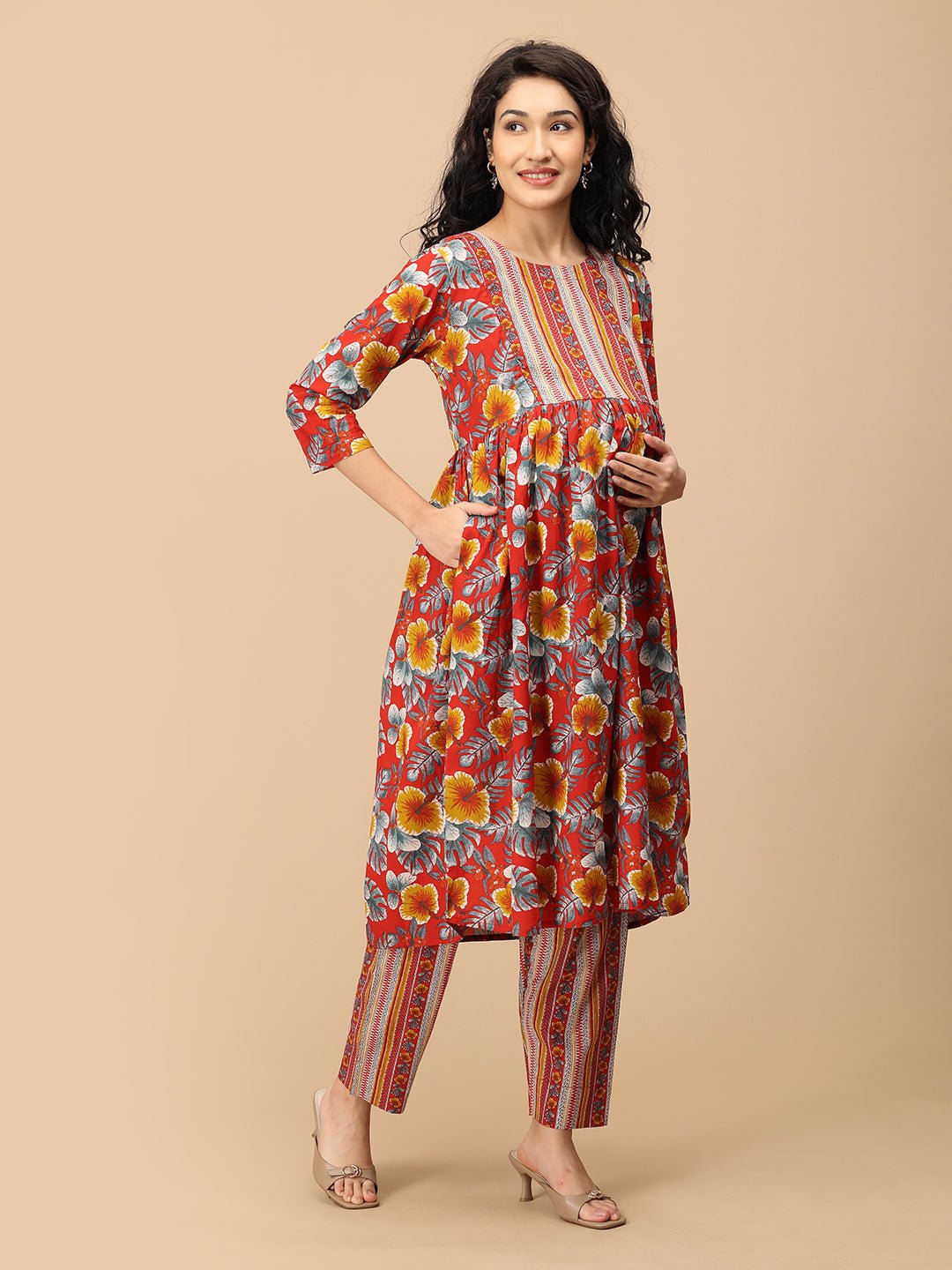 Side view of maternity kurta set with red floral print pant