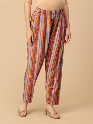 Side view Red striped maternity pants with floral prints ‚Äì comfortable cotton pregnancy trousers