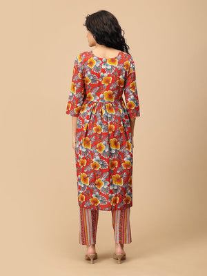 Back view of red floral maternity and nursing kurta paired with striped pregnancy pants