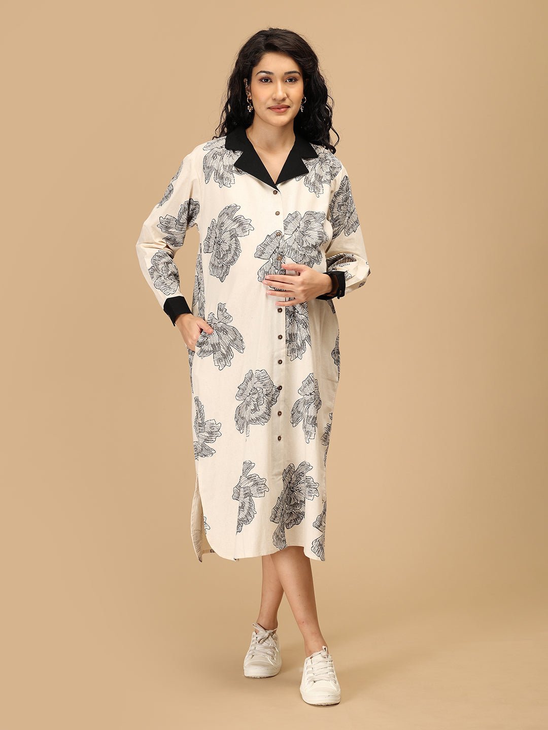 Front angle of The Mom Store Sketch Petal maternity dress with hand pockets and relaxed fit.
