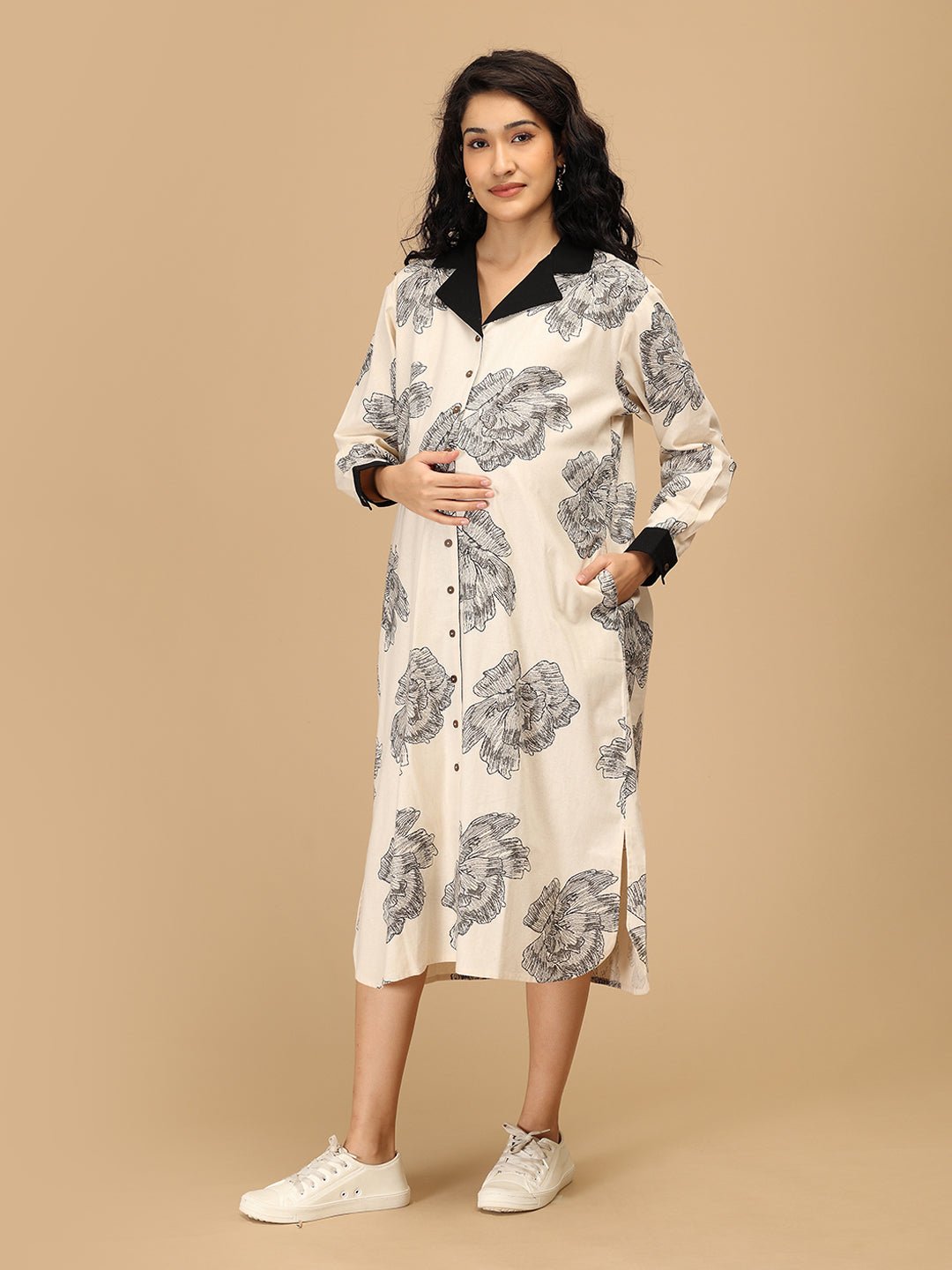 Smiling pregnant woman in The Mom Store Sketch Petal maternity and nursing dress front view.