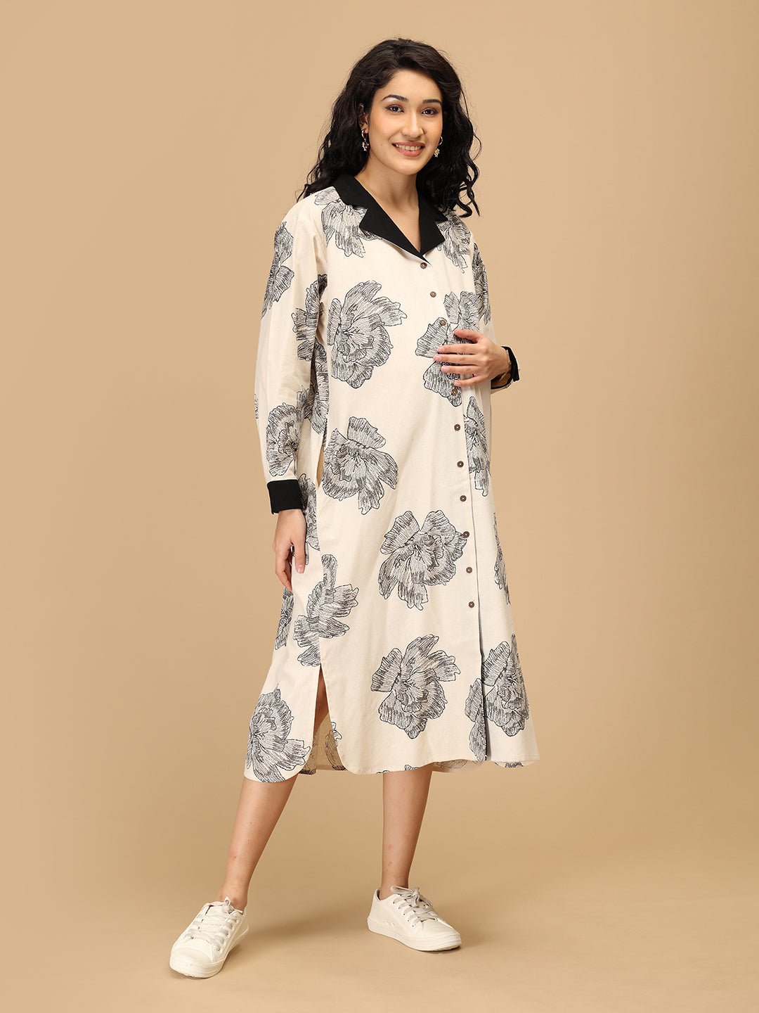 Side pose showing The Mom Store Sketch Petal maternity dress with button-down nursing access.