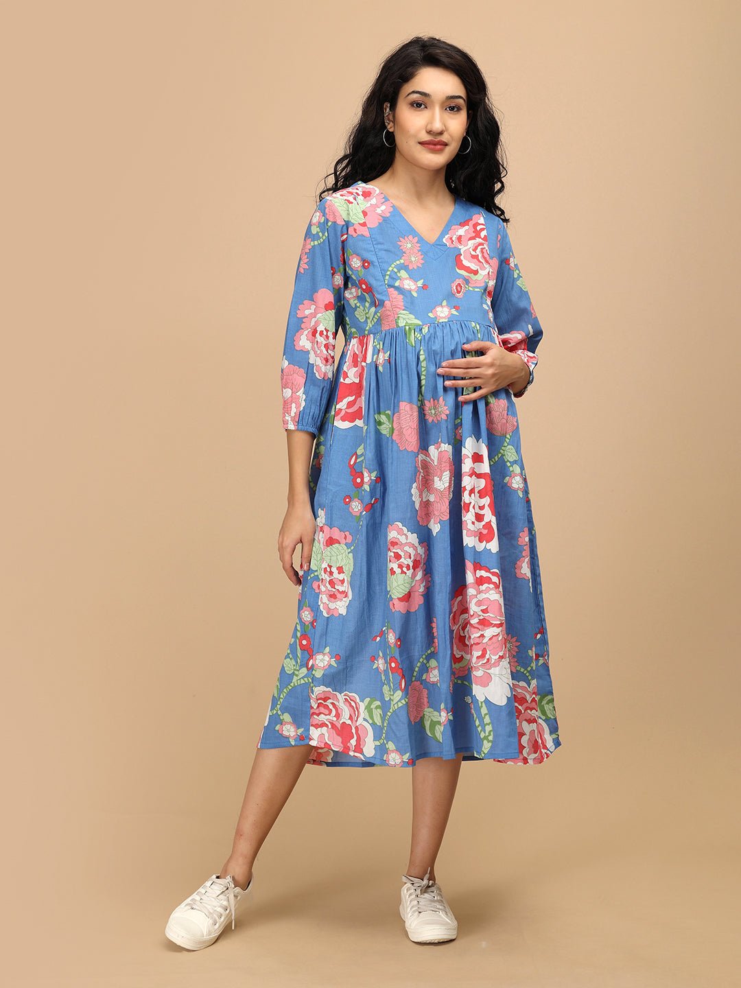 The Mom Store Sky Bloom maternity and nursing dress with pink floral prints.