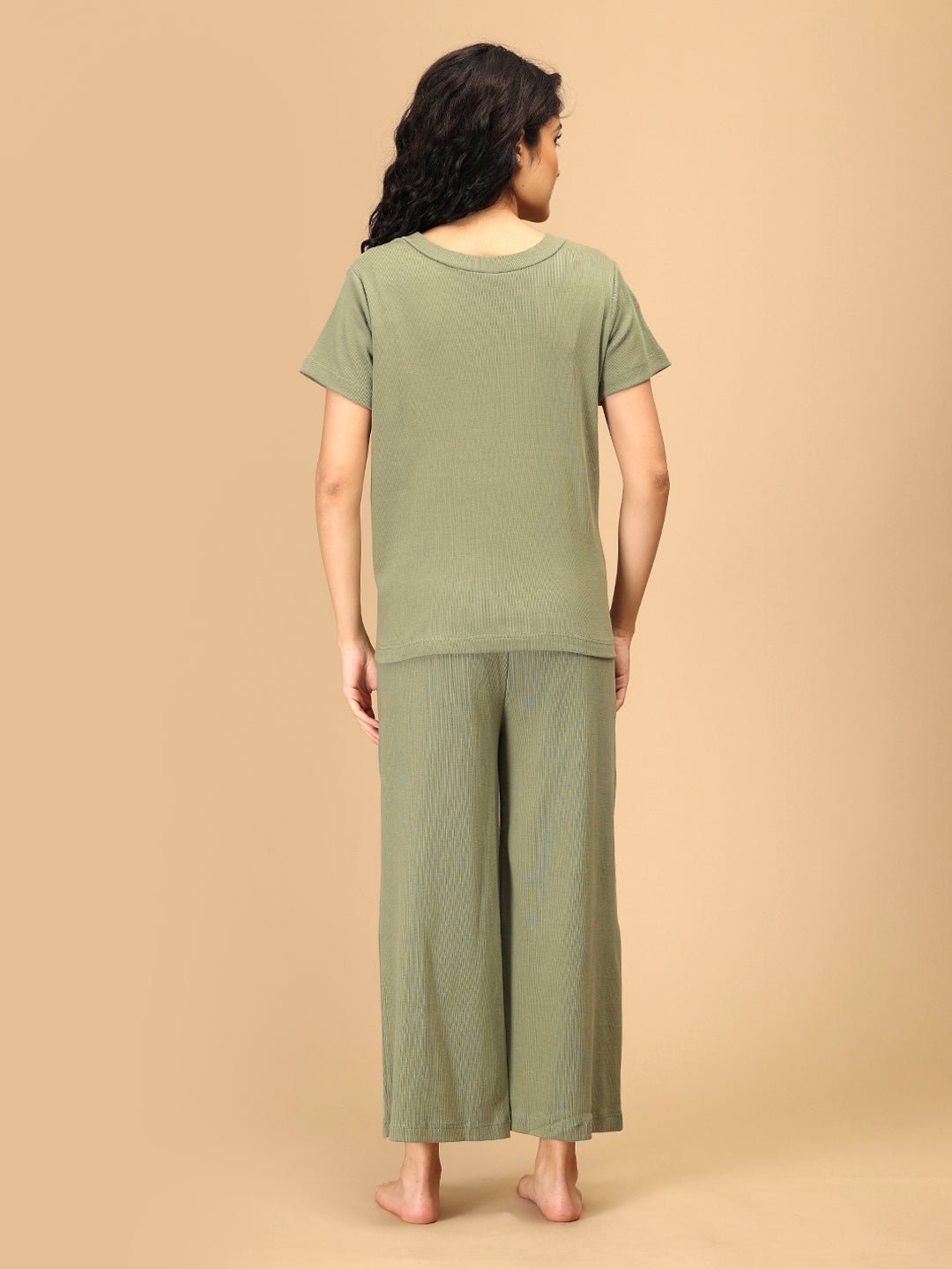 Back view of sage green maternity and nursing nightwear set with ribbed top and wide-leg pants