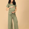 Stay-in Sage maternity and nursing nightwear set in green ribbed cotton with short-sleeve top and relaxed pants – front view