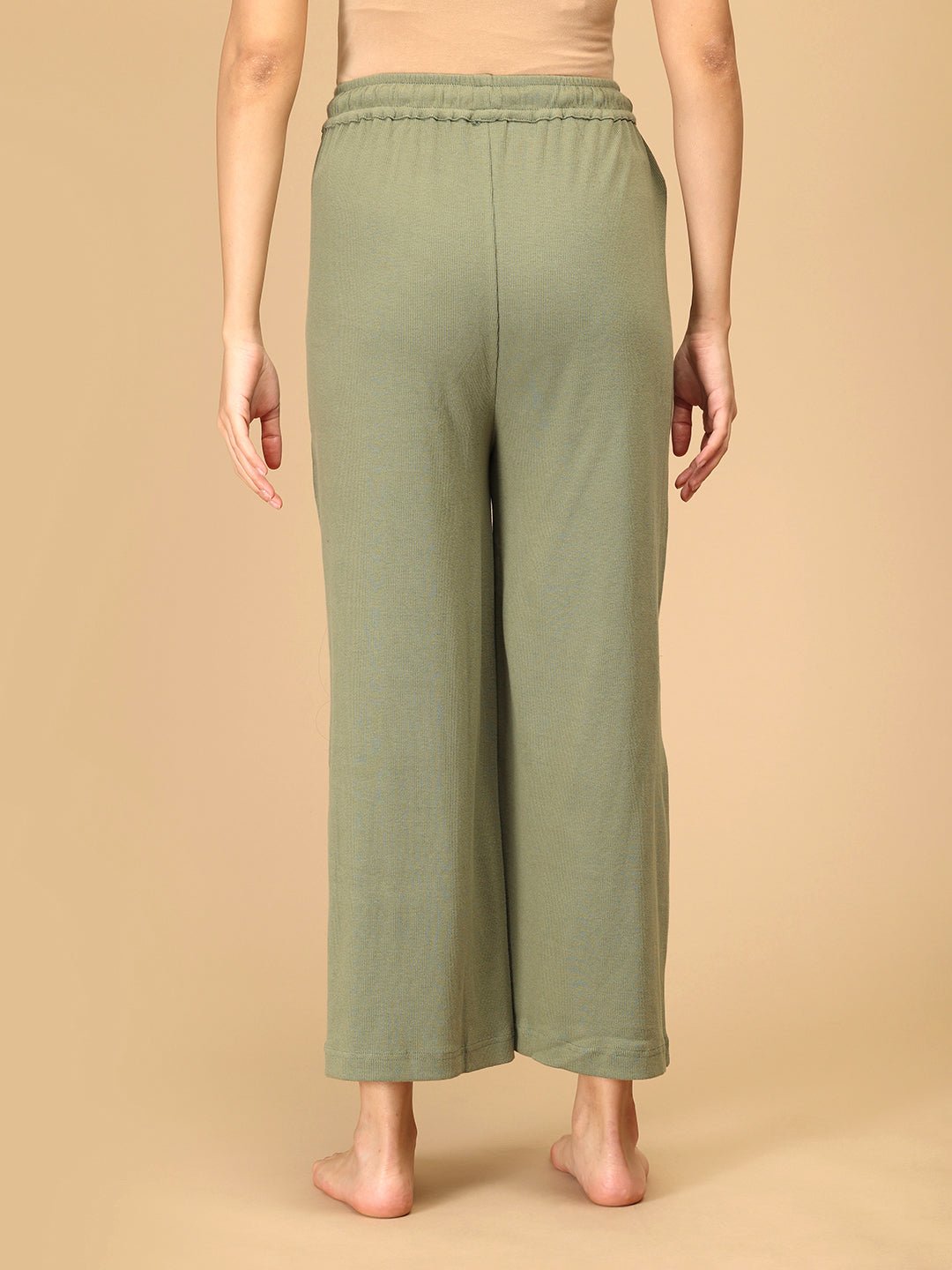 Back view of maternity wide-leg lounge pants in sage green ribbed fabric