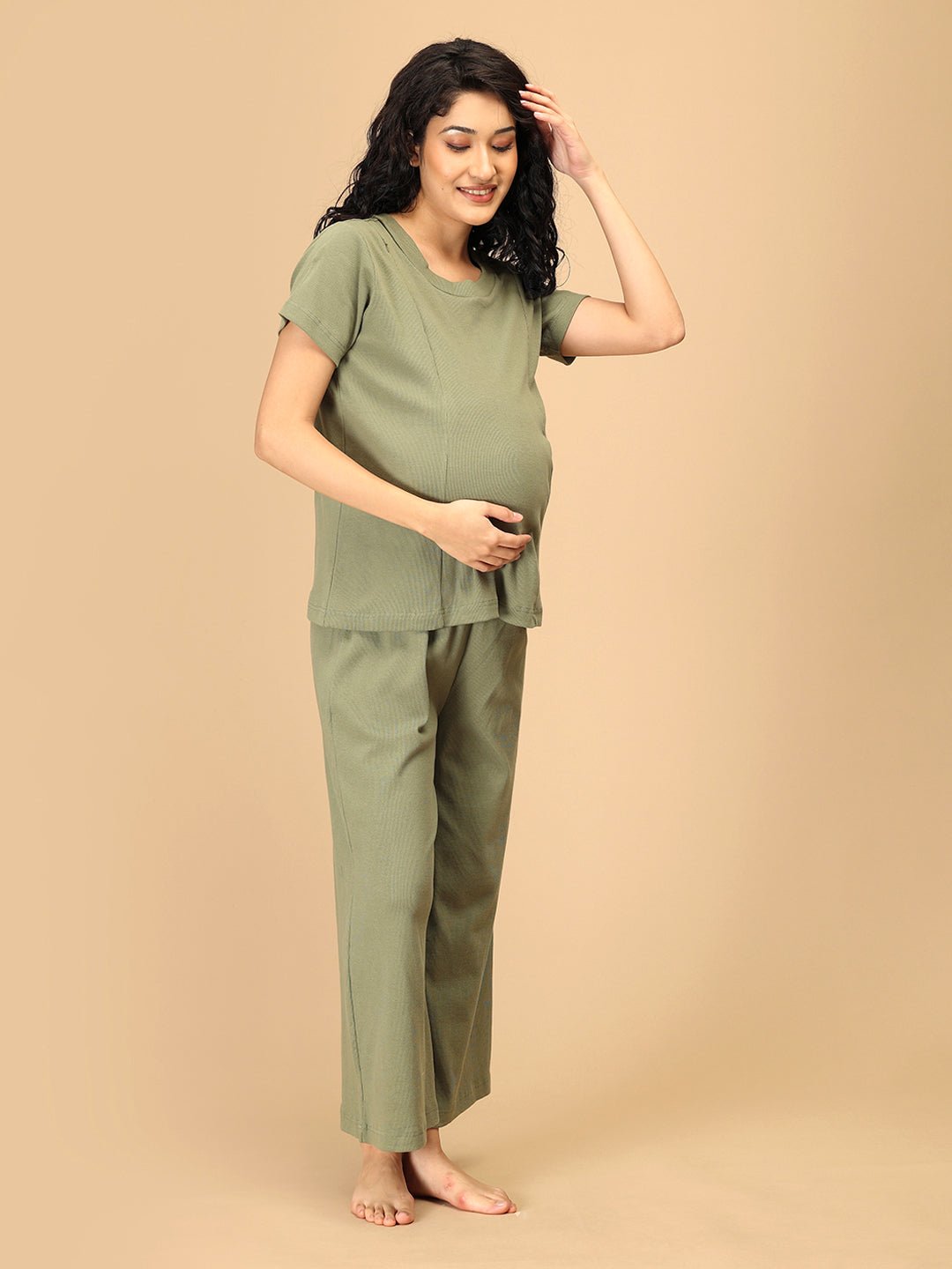 Soft green ribbed maternity sleepwear set with nursing access – relaxed front pose