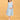 Pregnant model standing in blue striped nursing dress.