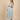 Blue white striped sleeveless maternity maxi dress worn alone, side view, comfortable bump-friendly fit.