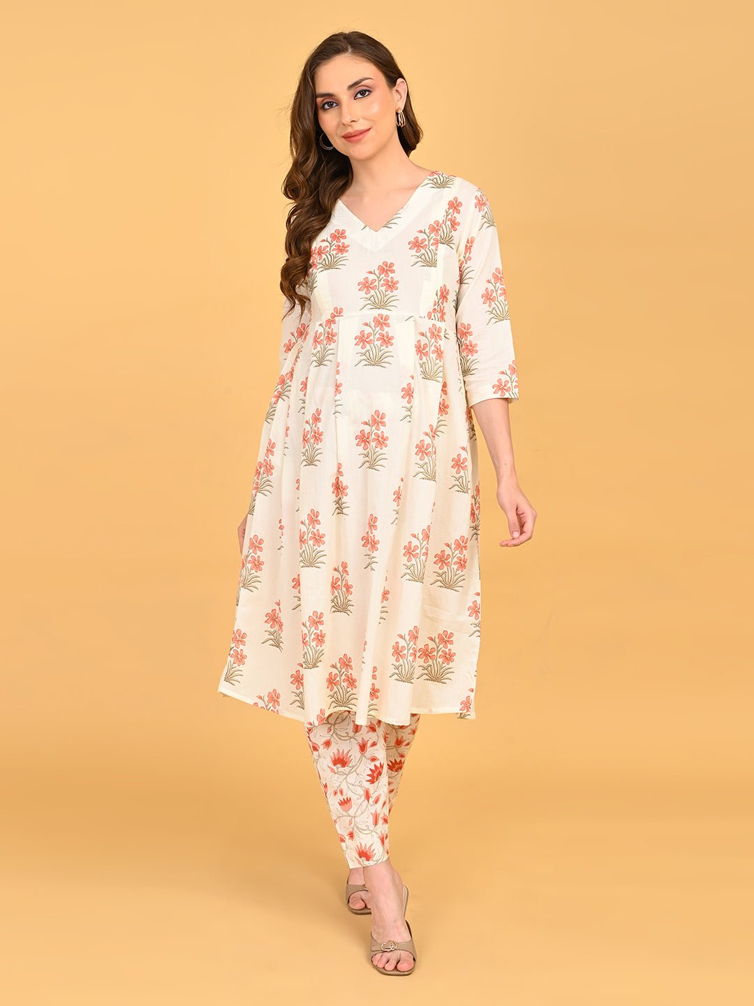 Model posing in Sukoon Ensemble Maternity and Nursing Kurta Set with coordinated floral prints and relaxed maternity silhouette.