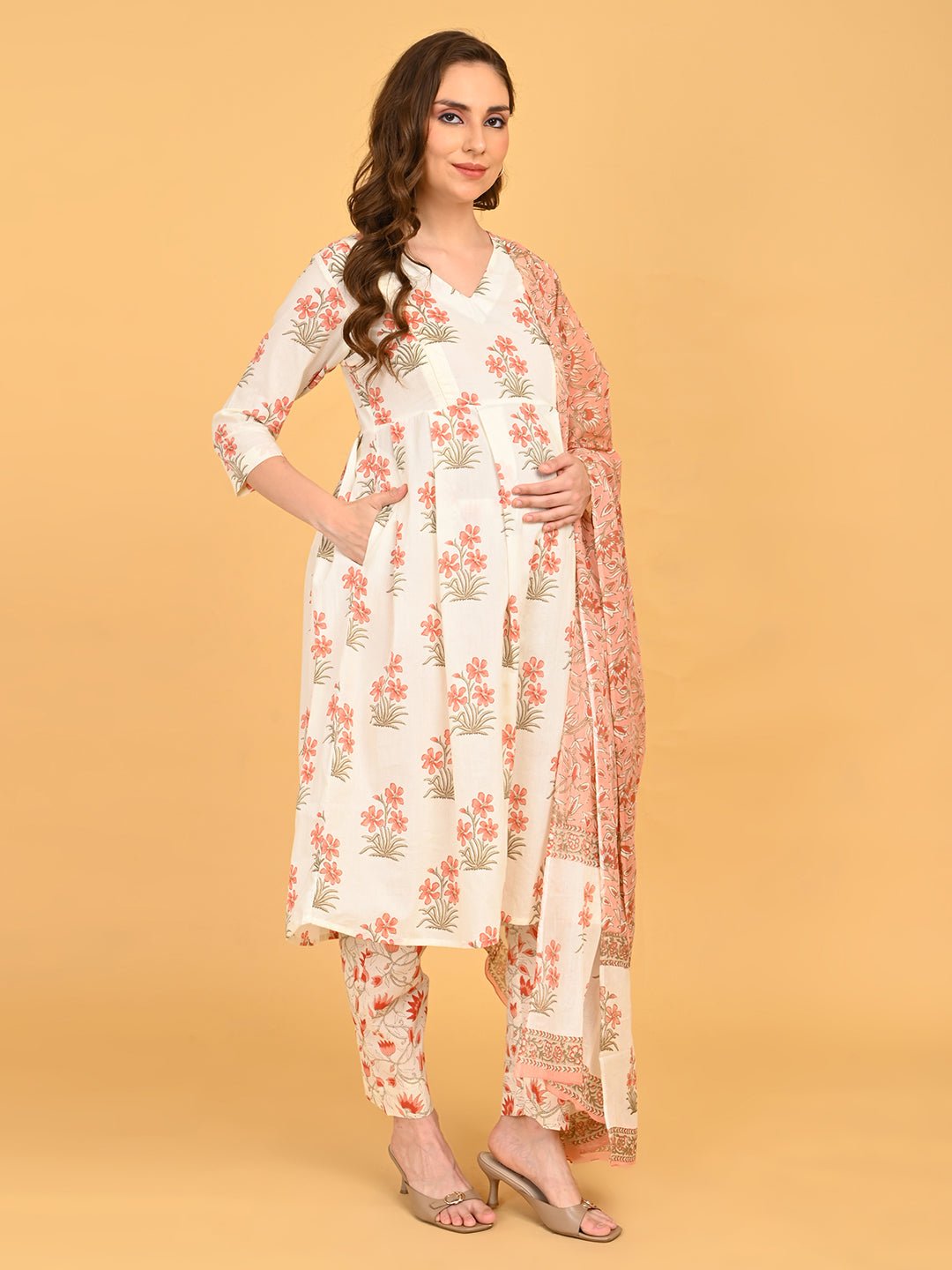 Model posing in Sukoon Ensemble Maternity and Nursing Kurta Set With Dupatta with coordinated floral prints and relaxed maternity silhouette.