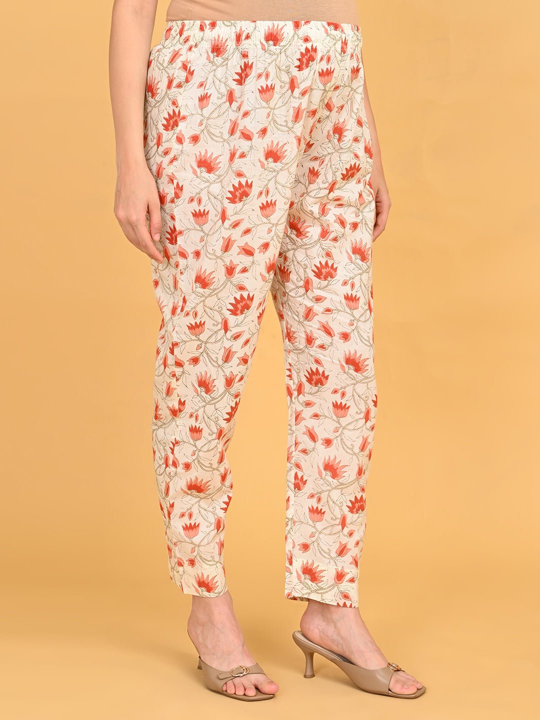 Side view of floral printed straight-fit pants from Sukoon Ensemble Maternity and Nursing Kurta Set With Dupatta.