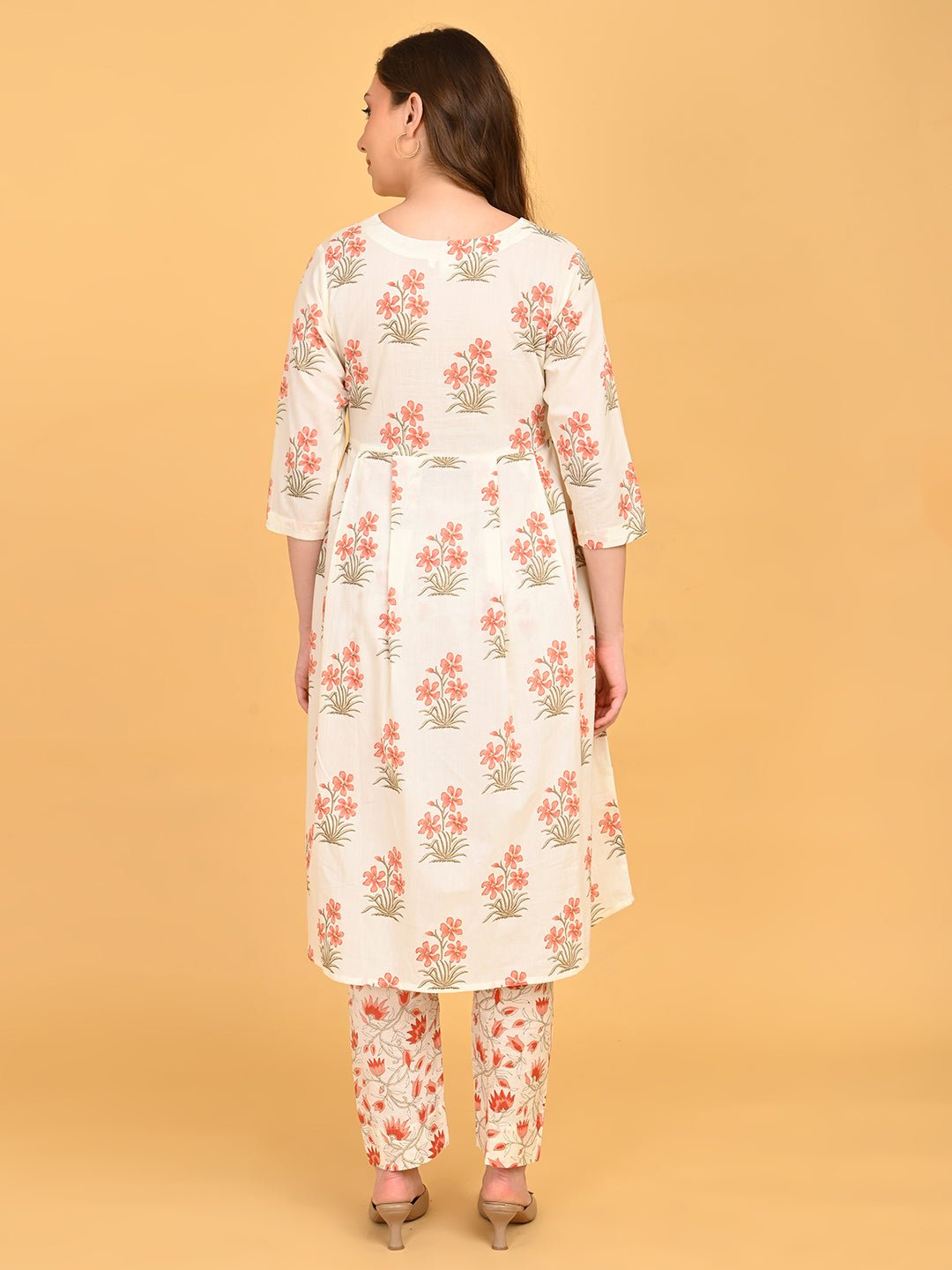 Back view of Sukoon Ensemble Maternity and Nursing Kurta Set featuring cream floral kurta and printed straight-fit pants.