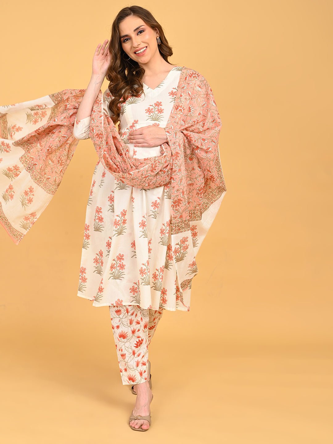 Model walking in Sukoon Ensemble Maternity and Nursing Kurta Set With Dupatta with V-neck floral kurta and coordinated pants.