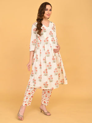 Model posing in Sukoon Ensemble Maternity and Nursing Kurta Set with coordinated floral prints and relaxed maternity silhouette.