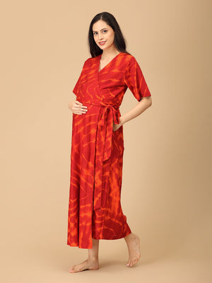 Side view of The Mom Store red maternity wrap dress with tie belt and comfortable fit.