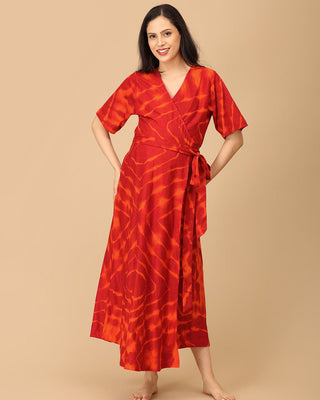 The Mom Store red tie-dye maternity and nursing dress, full front view with flattering silhouette.