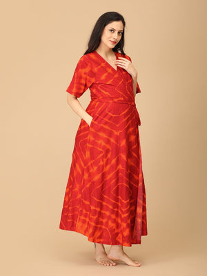 The Mom Store red tie-dye maternity wrap dress stylish three-quarter view with short sleeves.