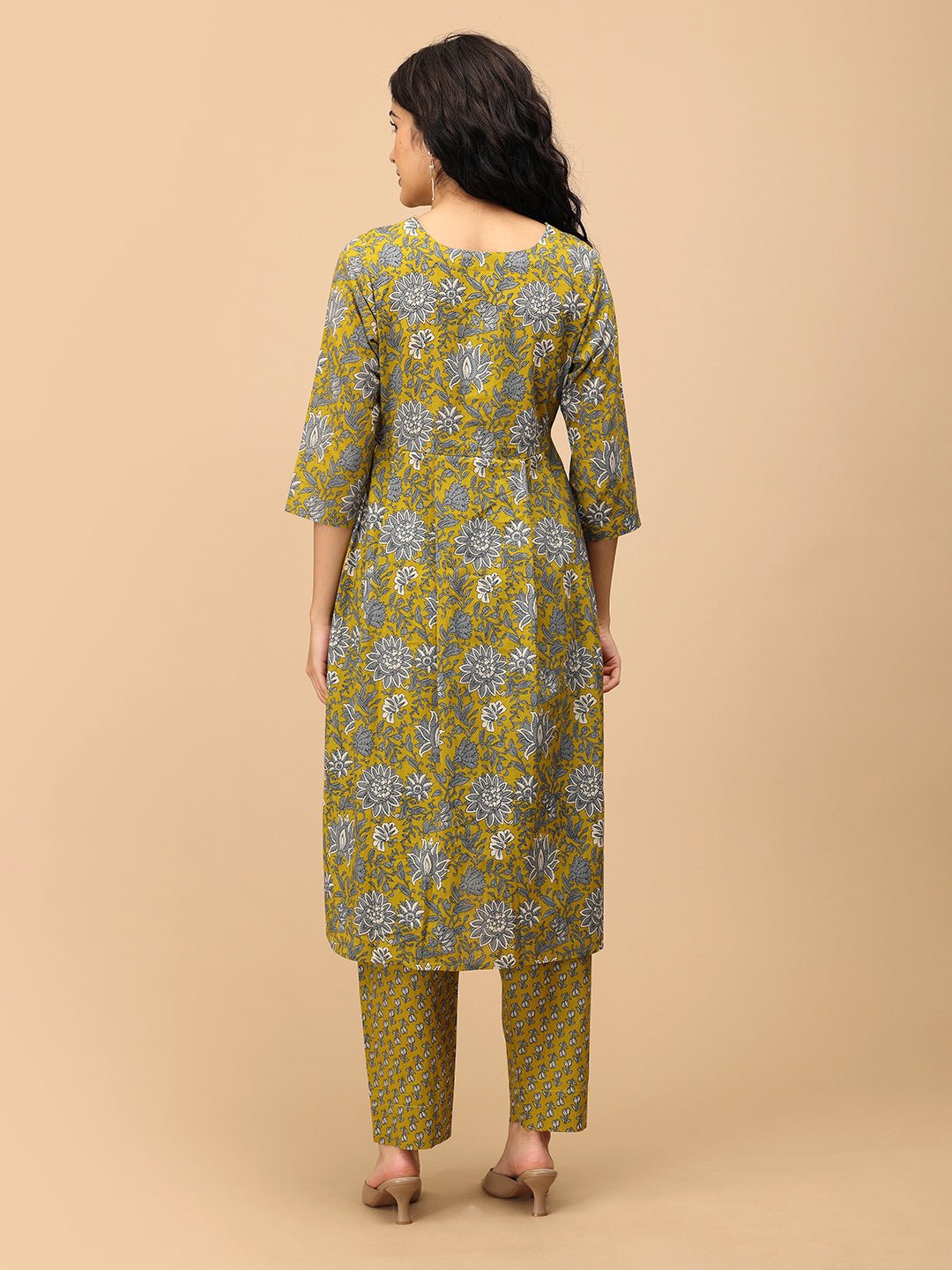 Back view of Sunehri Blooms V-neck yellow floral maternity and nursing kurta with printed straight-fit pants.