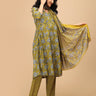 Model showcasing Sunehri Blooms yellow floral maternity kurta and dupatta set – side view with flowy dupatta.”