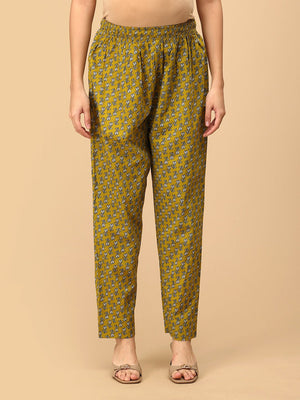 Yellow printed maternity pants ‚Äì front view of Sunehri Blooms breathable cotton elastic-waist trousers.