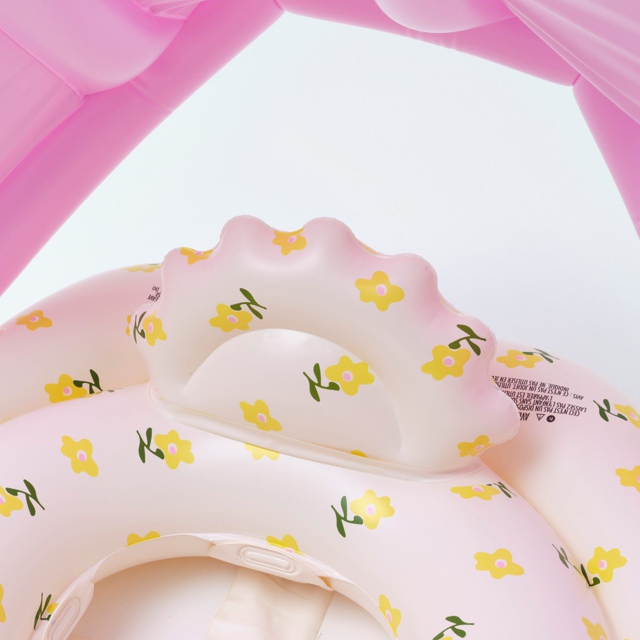 Inflatable pool float with floral pattern on a white background