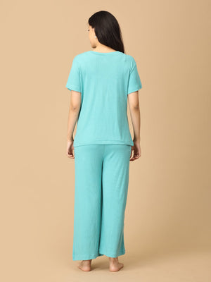 pregnant model wearing Tide Up Together Maternity and Nursing Nightwear Set from the mom store facing backwards