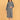 Pregnant model standing comfortably in grey maternity hoodie dress with relaxed knee-length silhouette.