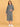 Pregnant model standing comfortably in grey maternity hoodie dress with relaxed knee-length silhouette.