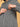 Close-up of hidden horizontal zipper on Undercover Cozy maternity hoodie dress for easy nursing access.