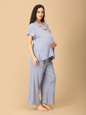 Pregnant model wearing Waffle Cloud Maternity and Nursing Pajama Set from the mom store caressing her belly