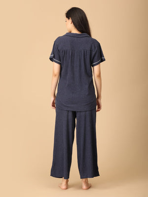 Close up of a Pregnant lady wearing Waffle Walks Maternity and Nursing Pajama Set from the mom store facing backwards