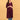 Three-quarter view of wine maternity kurta highlighting bump-friendly A-line silhouette.