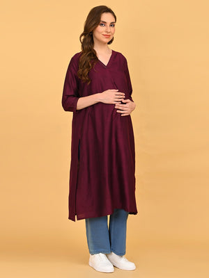 Three-quarter view of wine maternity kurta highlighting bump-friendly A-line silhouette.