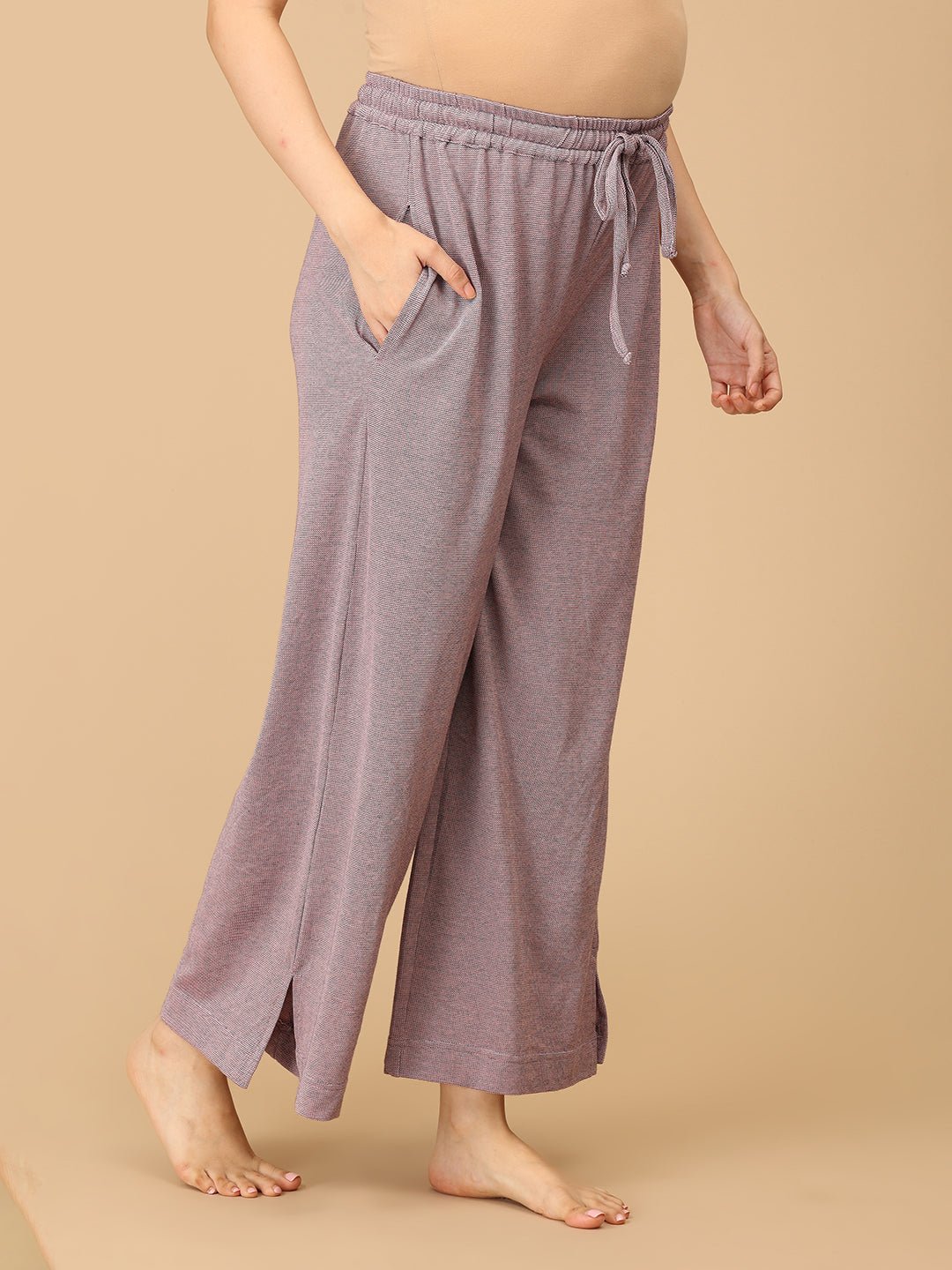 Stay comfortable and stylish through every stage of motherhood with our Yawn & On Maternity and Nursing Nightwear Set. Crafted from soft, breathable cotton-blend fabric, this nightwear set features a button-down top for easy nursing access and elasticated waistband pants for a perfect fit during and after pregnancy. Designed for all-day comfort, it’s ideal for maternity sleepwear, lounging, and postpartum wear. The relaxed silhouette and elegant collared design add a touch of sophistication to your bedtime 