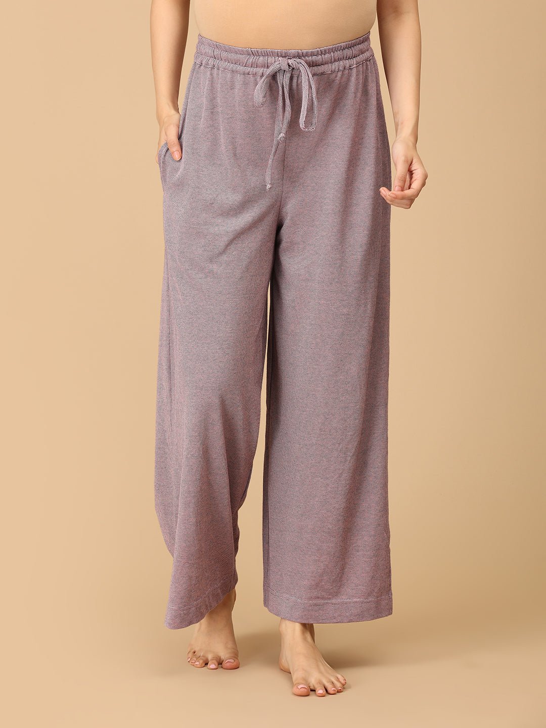 Stay comfortable and stylish through every stage of motherhood with our Yawn & On Maternity and Nursing Nightwear Set. Crafted from soft, breathable cotton-blend fabric, this nightwear set features a button-down top for easy nursing access and elasticated waistband pants for a perfect fit during and after pregnancy. Designed for all-day comfort, it’s ideal for maternity sleepwear, lounging, and postpartum wear. The relaxed silhouette and elegant collared design add a touch of sophistication to your bedtime 