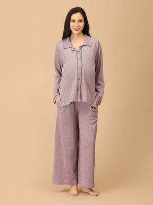 Stay comfortable and stylish through every stage of motherhood with our Yawn & On Maternity and Nursing Nightwear Set. Crafted from soft, breathable cotton-blend fabric, this nightwear set features a button-down top for easy nursing access and elasticated waistband pants for a perfect fit during and after pregnancy. Designed for all-day comfort, it‚Äôs ideal for maternity sleepwear, lounging, and postpartum wear. The relaxed silhouette and elegant collared design add a touch of sophistication to your bedtim