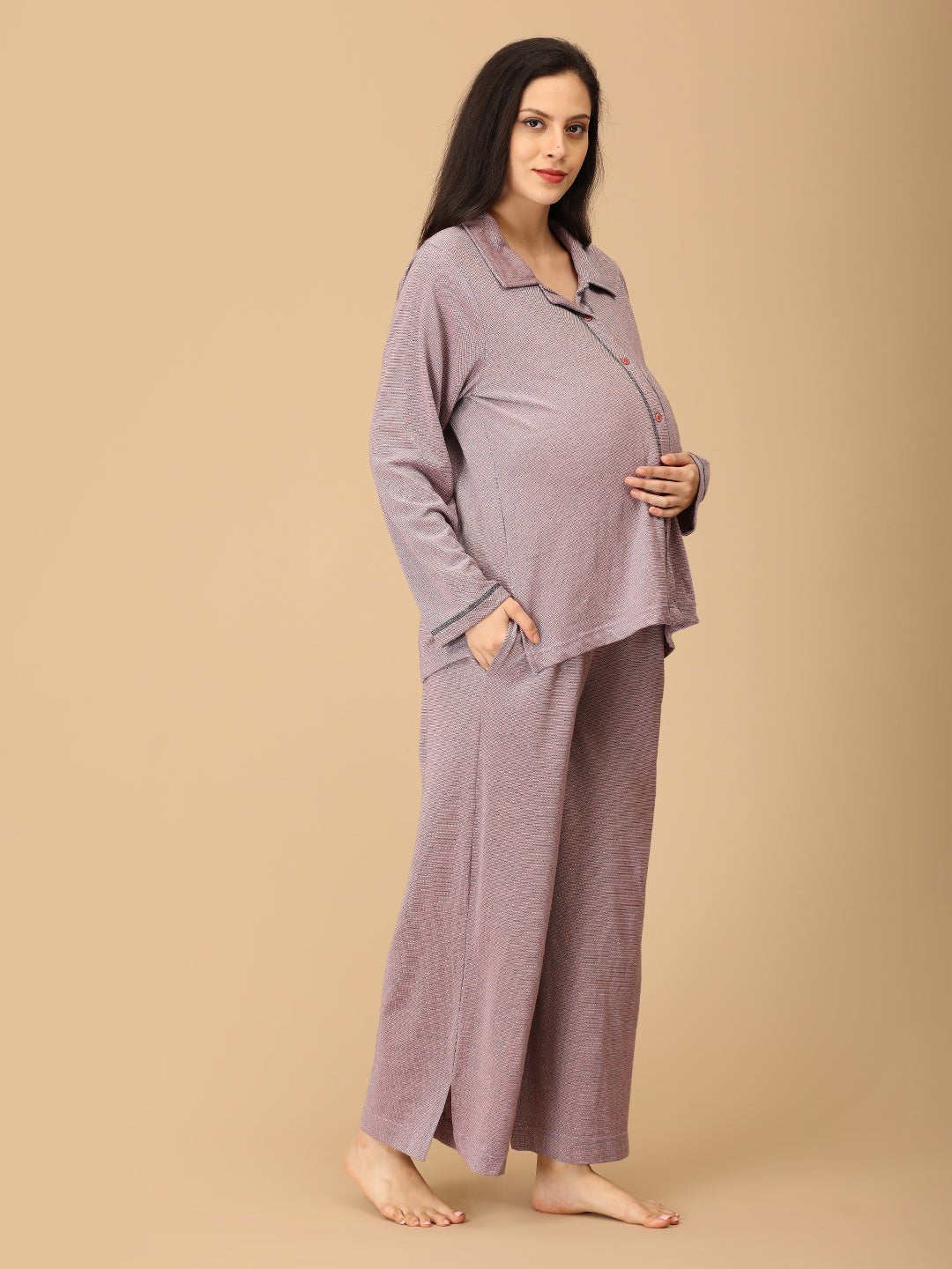 Stay comfortable and stylish through every stage of motherhood with our Yawn & On Maternity and Nursing Nightwear Set. Crafted from soft, breathable cotton-blend fabric, this nightwear set features a button-down top for easy nursing access and elasticated waistband pants for a perfect fit during and after pregnancy. Designed for all-day comfort, it’s ideal for maternity sleepwear, lounging, and postpartum wear. The relaxed silhouette and elegant collared design add a touch of sophistication to your bedtime 
