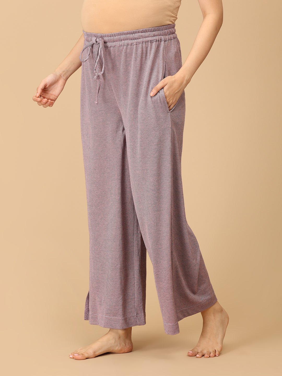 Stay comfortable and stylish through every stage of motherhood with our Yawn & On Maternity and Nursing Nightwear Set. Crafted from soft, breathable cotton-blend fabric, this nightwear set features a button-down top for easy nursing access and elasticated waistband pants for a perfect fit during and after pregnancy. Designed for all-day comfort, it’s ideal for maternity sleepwear, lounging, and postpartum wear. The relaxed silhouette and elegant collared design add a touch of sophistication to your bedtime 
