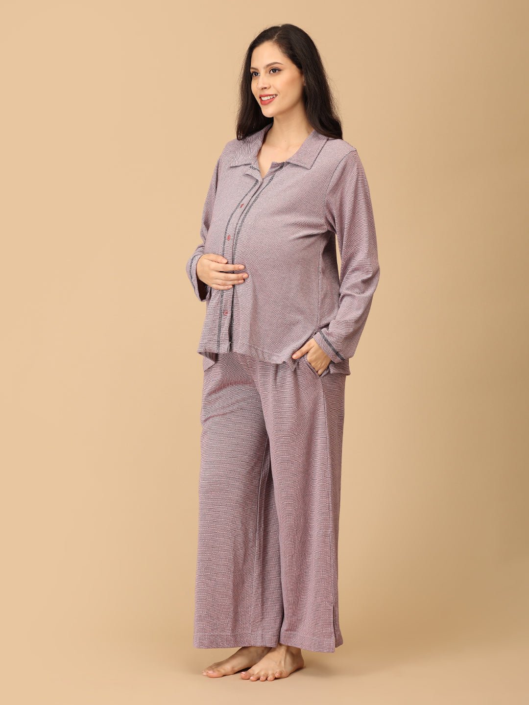 Stay comfortable and stylish through every stage of motherhood with our Yawn & On Maternity and Nursing Nightwear Set. Crafted from soft, breathable cotton-blend fabric, this nightwear set features a button-down top for easy nursing access and elasticated waistband pants for a perfect fit during and after pregnancy. Designed for all-day comfort, it’s ideal for maternity sleepwear, lounging, and postpartum wear. The relaxed silhouette and elegant collared design add a touch of sophistication to your bedtime 