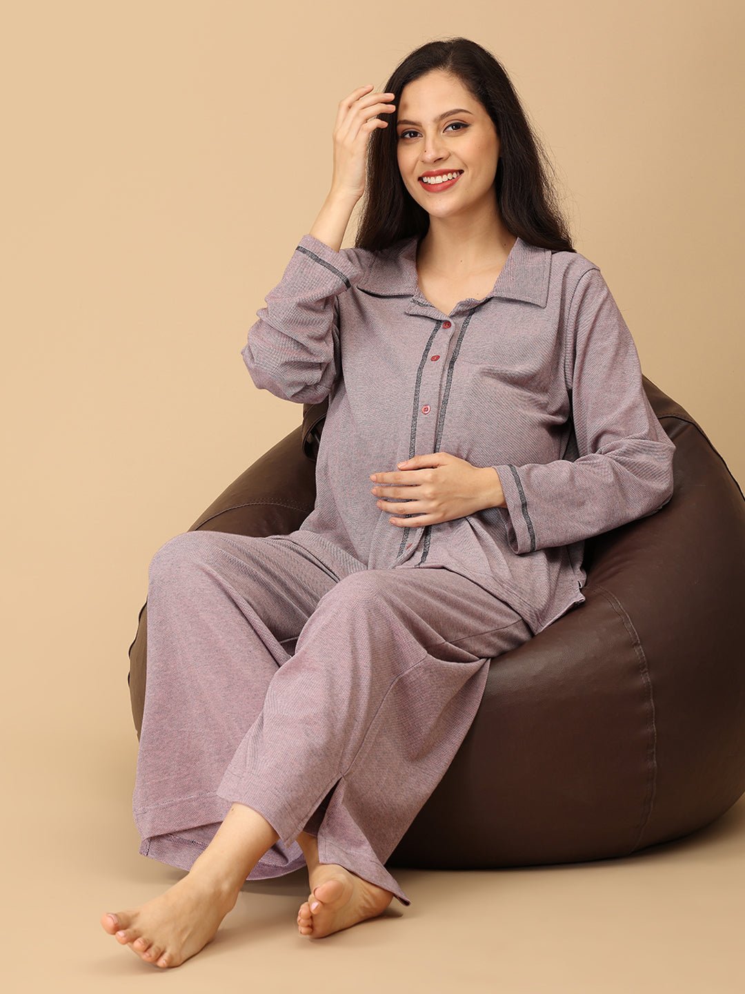 Stay comfortable and stylish through every stage of motherhood with our Yawn & On Maternity and Nursing Nightwear Set. Crafted from soft, breathable cotton-blend fabric, this nightwear set features a button-down top for easy nursing access and elasticated waistband pants for a perfect fit during and after pregnancy. Designed for all-day comfort, it’s ideal for maternity sleepwear, lounging, and postpartum wear. The relaxed silhouette and elegant collared design add a touch of sophistication to your bedtime 