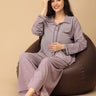 Stay comfortable and stylish through every stage of motherhood with our Yawn & On Maternity and Nursing Nightwear Set. Crafted from soft, breathable cotton-blend fabric, this nightwear set features a button-down top for easy nursing access and elasticated waistband pants for a perfect fit during and after pregnancy. Designed for all-day comfort, it’s ideal for maternity sleepwear, lounging, and postpartum wear. The relaxed silhouette and elegant collared design add a touch of sophistication to your bedtime 