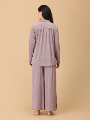 Stay comfortable and stylish through every stage of motherhood with our Yawn & On Maternity and Nursing Nightwear Set. Crafted from soft, breathable cotton-blend fabric, this nightwear set features a button-down top for easy nursing access and elasticated waistband pants for a perfect fit during and after pregnancy. Designed for all-day comfort, it‚Äôs ideal for maternity sleepwear, lounging, and postpartum wear. The relaxed silhouette and elegant collared design add a touch of sophistication to your bedtim